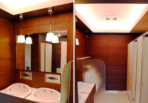 空間デザイン実績事例、大阪市のマンション、パレロワイヤル順慶町のトイレのリノベーション、左、工事が完了した落ち着いた雰囲気の男子トイレの洗面台、右、女子トイレと同じデザインでまとめた男子トイレの室内